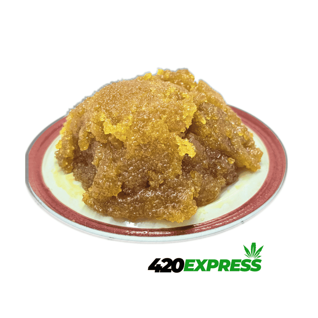 Close-up macro view of Watermelon Mojito live resin sugar wax and shimmering terp sauce